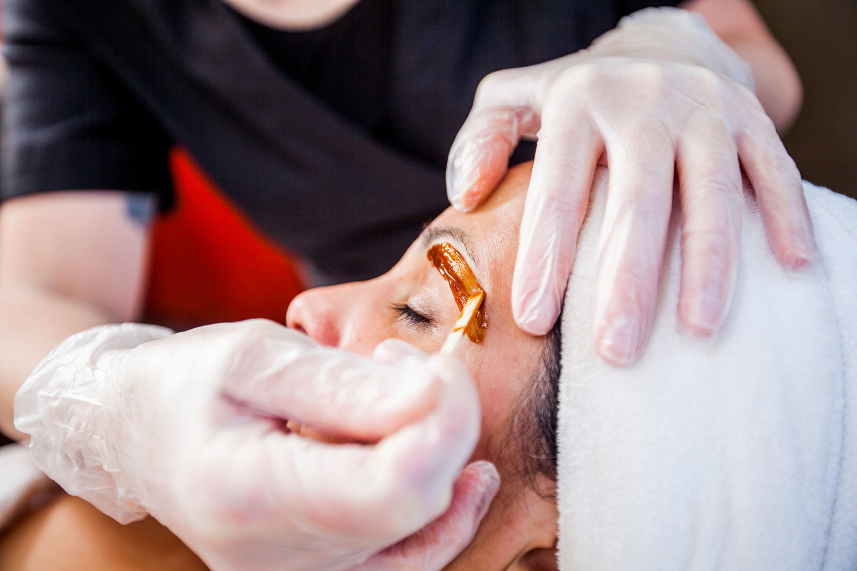 Woman Getting Her Eyebrows Waxed